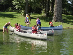 camp girls canoes